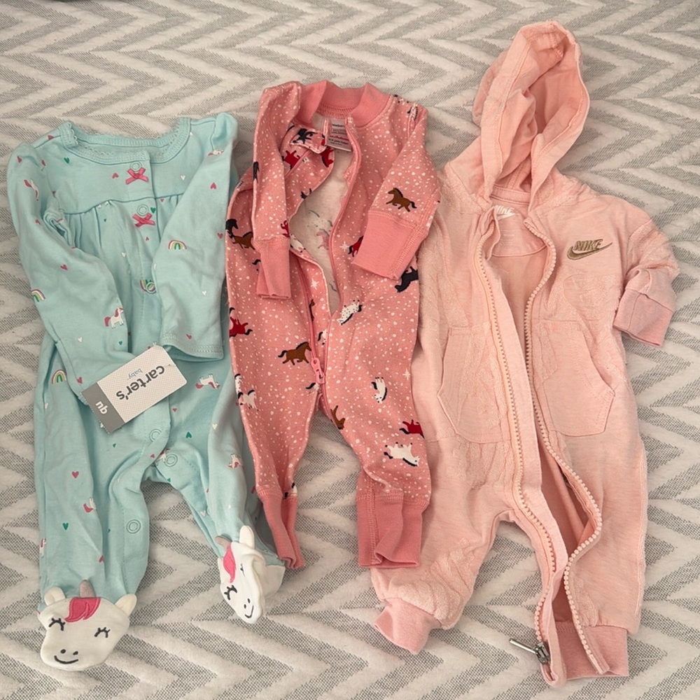 Newborn onesie bundle- Hanna Andersson EUC, Nike EUC, and Carter NWT